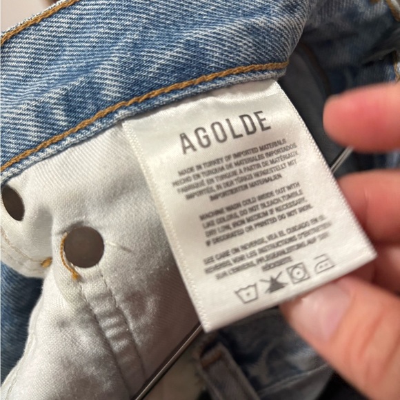 AGOLDE Criss Cross Symbol Medium Indigo Wash Asymmetrical Cutoff Jean Shorts - Picture 10 of 11